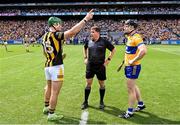 9 July 2023; Referee Colm Lyons with team captains Eoin Cody of Kilkenny and Tony Kelly of Clare for the coin toss before the GAA Hurling All-Ireland Senior Championship semi-final match between Kilkenny and Clare at Croke Park in Dublin. Photo by Piaras Ó Mídheach/Sportsfile
