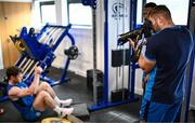 13 July 2023; Jordan Larmour takes a photograph of Rob Russell during a Leinster rugby gym session at the Ken Wall Centre of Excellence in Dublin. Photo by Harry Murphy/Sportsfile
