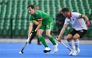 13 July 2023; Sean Murray of Ireland in action against Xaver Hasun of Austria during the Men's Hockey International match between Ireland v Austria at the Sport Ireland Campus in Dublin. Photo by Brendan Moran/Sportsfile