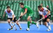 13 July 2023; Sean Murray of Ireland in action against Fabian Unterkircher, left, and Xaver Hasun of Austria during the Men's Hockey International match between Ireland v Austria at the Sport Ireland Campus in Dublin. Photo by Brendan Moran/Sportsfile