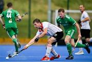 13 July 2023; Oliver Kern of Austria in action against Sam Hyland of Ireland during the Men's Hockey International match between Ireland v Austria at the Sport Ireland Campus in Dublin. Photo by Brendan Moran/Sportsfile