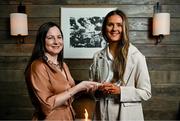 14 July 2023; Clare’s Fidelma Marrinan, right, is presented with The Croke Park/LGFA Player of the Month award for June 2023 by Ina Lazar, Sales Manager, The Croke Park, at The Croke Park in Jones Road, Dublin. Fidelma was in brilliant form for Clare during the month of June and she scored 2-19 during the group stages as the Banner County progressed to the knockout stages of the TG4 All-Ireland Intermediate Championship. Fidelma followed up with a haul of 2-9 last Sunday as Clare defeated Westmeath to book a semi-final clash with Antrim on Sunday July 23. Photo by Tyler Miller/Sportsfile