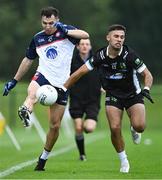 14 July 2023; Danny Corridan of New York in action against Joel Powney of Warwickshire during the GAA Football All-Ireland Junior Championship semi-final match between New York and Warwickshire at the GAA Centre of Excellence in Abbotstown, Dublin. Photo by Piaras Ó Mídheach/Sportsfile