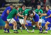 14 July 2023; Ruadhan Quinn of Ireland is tackled by Louis Penverne of France during the U20 Rugby World Cup Final between Ireland and France at Athlone Sports Stadium in Cape Town, South Africa. Photo by Shaun Roy/Sportsfile