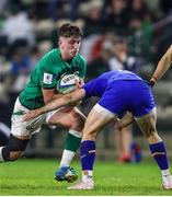 14 July 2023; John Devine of Ireland, left, in action against Hugo Reus of France during the U20 Rugby World Cup Final between Ireland and France at Athlone Sports Stadium in Cape Town, South Africa. Photo by Shaun Roy/Sportsfile