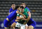 14 July 2023; John Devine of Ireland is tackled by Leo Drouet and Pierre Jouvin of France during the U20 Rugby World Cup Final match between Ireland and France at Athlone Sports Stadium in Cape Town, South Africa. Photo by Shaun Roy/Sportsfile