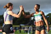 14 July 2023; Lorene Bazolo of Portugal, right, is congratulated by Molly Hourihan of Ireland and Dundrum South Dublin AC, after winning the Bon Secours Hospital Dublin women's 200m  during the 2023 Morton Games at Morton Stadium in Santry, Dublin. Photo by Sam Barnes/Sportsfile