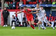 14 July 2023; Sean Boyd of Shelbourne in action against Kacper Radkowski of Bohemians during the SSE Airtricity Men's Premier Division match between Shelbourne and Bohemians at Tolka Park in Dublin. Photo by Tyler Miller/Sportsfile