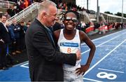 14 July 2023; Ryan Mphahlele of South Africa is congratulated by Meet Director Noel Guiden after winning the Morton Mile, sponsored by Commercial Hygiene Services during the 2023 Morton Games at Morton Stadium in Santry, Dublin. Photo by Sam Barnes/Sportsfile
