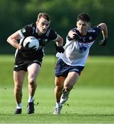 14 July 2023; Eoghan O'Sullivan of Warwickshire in action against Mikey Boyle of New York during the GAA Football All-Ireland Junior Championship semi-final match between New York and Warwickshire at the GAA Centre of Excellence in Abbotstown, Dublin. Photo by Piaras Ó Mídheach/Sportsfile