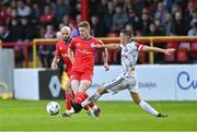 14 July 2023; Kameron Ledwidge of Shelbourne in action against Keith Buckley of Bohemians during the SSE Airtricity Men's Premier Division match between Shelbourne and Bohemians at Tolka Park in Dublin. Photo by Tyler Miller/Sportsfile
