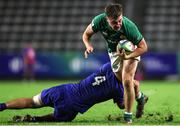 14 July 2023; Hugo Auradou of France tackles Ireland captain Gus McCarthy during the U20 Rugby World Cup Final between Ireland and France at Athlone Sports Stadium in Cape Town, South Africa. Photo by Shaun Roy/Sportsfile