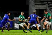 14 July 2023; Sam Prendergast of Ireland attempts to get past Lenni Nouchi of France during the U20 Rugby World Cup Final between Ireland and France at Athlone Sports Stadium in Cape Town, South Africa. Photo by Shaun Roy/Sportsfile