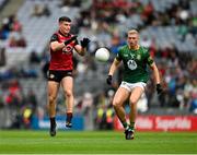 15 July 2023; Daniel Guinness of Down in action against Conor Gray of Meath during the Tailteann Cup Final match between Down and Meath at Croke Park in Dublin. Photo by Brendan Moran/Sportsfile