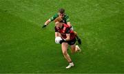 15 July 2023; Daniel Magill of Down in action against Seán Coffey of Meath during the Tailteann Cup Final match between Down and Meath at Croke Park in Dublin. Photo by Daire Brennan/Sportsfile