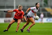 15 July 2023; Eimear Meaney of Cork in action against Eve Lavery of Armagh during the TG4 Ladies Football All-Ireland Senior Championship quarter-final match between Armagh and Cork at BOX-IT Athletic Grounds in Armagh. Photo by Ben McShane/Sportsfile