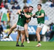 15 July 2023; Meath players, from left Seán Coffey, Keith Curtis and Harry O'Higgins celebrate after the Tailteann Cup Final match between Down and Meath at Croke Park in Dublin. Photo by Brendan Moran/Sportsfile