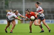 15 July 2023; Clodagh McCambridge of Armagh wins possession from Laura O'Mahony of Cork during the TG4 Ladies Football All-Ireland Senior Championship quarter-final match between Armagh and Cork at BOX-IT Athletic Grounds in Armagh. Photo by Ben McShane/Sportsfile