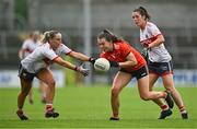15 July 2023; Clodagh McCambridge of Armagh wins possession from Laura O'Mahony of Cork during the TG4 Ladies Football All-Ireland Senior Championship quarter-final match between Armagh and Cork at BOX-IT Athletic Grounds in Armagh. Photo by Ben McShane/Sportsfile