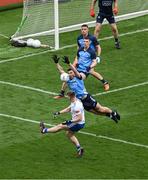 15 July 2023; Michael Bannigan of Monaghan has his shot blocked by David Byrne of Dublin during the GAA Football All-Ireland Senior Championship semi-final match between Dublin and Monaghan at Croke Park in Dublin. Photo by Daire Brennan/Sportsfile