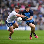 15 July 2023; Lee Gannon of Dublin is tackled by Conor McCarthy of Monaghan during the GAA Football All-Ireland Senior Championship semi-final match between Dublin and Monaghan at Croke Park in Dublin. Photo by Brendan Moran/Sportsfile