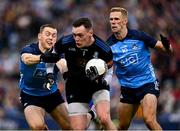 15 July 2023; Monaghan goalkeeper Rory Beggan is tackled by  Dublin players Con O'Callaghan, left, and Paul Mannion during the GAA Football All-Ireland Senior Championship semi-final match between Dublin and Monaghan at Croke Park in Dublin. Photo by Brendan Moran/Sportsfile