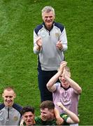 15 July 2023; Meath manager Colm O'Rourke celebrates as captain Donal Keogan lifts the Tailteann Cup after the Tailteann Cup Final match between Down and Meath at Croke Park in Dublin. Photo by Daire Brennan/Sportsfile