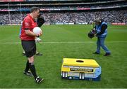 15 July 2023; Croke Park hosted ‘Sustainability Day’ on Saturday July 15th as they showcased some of the sustainability initiatives in place at the stadium. Referee Sean Hurson takes the ball from a 'Dublin Bus'. Photo by Brendan Moran/Sportsfile