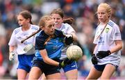 15 July 2023; Chloe Carey, Lisnagry NS, Lisnagry, Limerick, representing Dublin, and Lara McAleer, St. Mary's PS, Cabragh, Tyrone, representing Monaghan, during the INTO Cumann na mBunscol GAA Respect Exhibition Go Games at the GAA Football All-Ireland Senior Championship semi-final match between Dublin and Monaghan at Croke Park in Dublin. Photo by Ramsey Cardy/Sportsfile