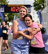 16 July 2023; Aisling Woods, left, and Marina Martin, both from Monaghan, celebrate after finishing the 2023 Irish Life Dublin Race Series-Fingal 10km which took place on Sunday 16th of July at Swords in Dublin. Photo by Sam Barnes/Sportsfile