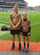 15 July 2023; Referee Niamh Devaney, Ballyvary Central NS, Castlebar, Mayo, and Referee AJ McKeown, Straide NS, Foxford, Mayo, ahead of the INTO Cumann na mBunscol GAA Respect Exhibition Go Games at the GAA Football All-Ireland Senior Championship semi-final match between Dublin and Monaghan at Croke Park in Dublin. Photo by Daire Brennan/Sportsfile