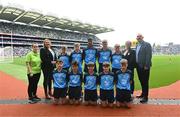 15 July 2023; The Dublin team, back row, left to right, Ben Lenihan, Dromcollogher NS, Charleville, Cork, Mike Funston, Enniskillen Integrated PS, Fermanagh, Richard Christie, St John the Apostle, Knockanacarra, Galway, Cillian Reilly, St John's NS, Castlebar, Mayo, TJ Flynn Reilly, Melview NS, Melview, Longford, front row, left to right, Harry Maguire, Kilmessan NS, Kilmessan, Meath, Jake Norris, Piltown NS, Piltown, Kilkenny, Fionn McCormack Crowe, St Mary's NS, Drumlish, Longford, Ryan O'Rourke, St Brendan's BNS, Loughrea, Galway, Jack 0'Toole, St Joseph's PS, Ballinrobe, Mayo, with GAA Safeguarding Officer Michelle Harte, LGFA Leinster President Trina Murray, Cumann na mBunscol President Mairéad O'Callaghan, and INTO CEO John Boyle, ahead of the INTO Cumann na mBunscol GAA Respect Exhibition Go Games at the GAA Football All-Ireland Senior Championship semi-final match between Dublin and Monaghan at Croke Park in Dublin. Photo by Daire Brennan/Sportsfile