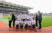 15 July 2023; The Monaghan team, back row, left to right, Tadgh Kelly, Newcestown NS, Bandon, Cork, Kevin Touhy, Kilgarvan Central School, Kilgarvan, Kerry, Russell Crowley, Laragh NS, Bandon, Cork, Ben O'Reilly, St. Mary's Boy's NS, Belturbet, Cavan, Jamie Irwin, Scoil Mhuire na mBuachaillí, Monaghan, front row, left to right, Thomas Kane, St Malachy's PS, Kilcoo, Down, Caolan Smith, St Oliver Plunkett's PS, Newry, Armagh, Jack McAnallen, Our Lady's PS, Benburb, Armagh, Max O Muineacháin, Gaelscoil Faithleann, Killarney, Kerry, Eanna McAuley, Mount Saint Michael's PS, Randalstown, Antrim, with GAA Safeguarding Officer Michelle Harte, LGFA Leinster President Trina Murray, Cumann na mBunscol President Mairéad O'Callaghan, and INTO CEO John Boyle, ahead of the INTO Cumann na mBunscol GAA Respect Exhibition Go Games at the GAA Football All-Ireland Senior Championship semi-final match between Dublin and Monaghan at Croke Park in Dublin. Photo by Daire Brennan/Sportsfile