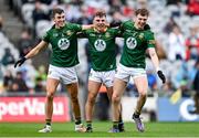15 July 2023; Meath players, from left, Harry O'Higgins, Seán Coffey and Adam O'Neill celebrate victory at the final whistle of the Tailteann Cup Final match between Down and Meath at Croke Park in Dublin. Photo by Brendan Moran/Sportsfile
