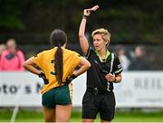 16 July 2023; Referee Angela Gallagher brandishes a red card during the LGFA All-Ireland U16 C Championship Final match between Clare and Antrim at Clane in Kildare. Photo by Sam Barnes/Sportsfile