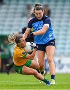 16 July 2023; Niamh McLaughlin of Donegal in action against Jennifer Dunne of Dublin during the TG4 LGFA All-Ireland Senior Championship Quarter-Final match between Donegal and Dublin at MacCumhaill Park in Ballybofey, Donegal. Photo by Ramsey Cardy/Sportsfile