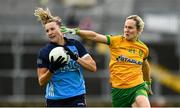 16 July 2023; Jennifer Dunne of Dublin in action against Karen Guthrie of Donegal during the TG4 LGFA All-Ireland Senior Championship Quarter-Final match between Donegal and Dublin at MacCumhaill Park in Ballybofey, Donegal. Photo by Ramsey Cardy/Sportsfile