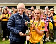 16 July 2023; Antrim captain Nicole Munce is presented with the cup by Peter Rice, Leinster LGFA, after winning the LGFA All-Ireland U16 C Championship Final match between Clare and Antrim at Clane in Kildare. Photo by Sam Barnes/Sportsfile