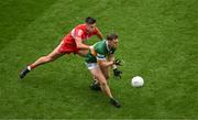 16 July 2023; Dara Moynihan of Kerry in action against Conor Doherty of Derry during the GAA Football All-Ireland Senior Championship Semi-Final match between Derry and Kerry at Croke Park in Dublin. Photo by Daire Brennan/Sportsfile