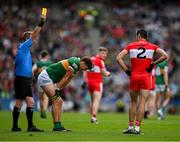 16 July 2023; Christopher McKaigue of Derry is shown a yellow card by referee Joe McQuillan after a tackle on Kerry captain David Clifford during the GAA Football All-Ireland Senior Championship Semi-Final match between Derry and Kerry at Croke Park in Dublin. Photo by Brendan Moran/Sportsfile