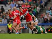 16 July 2023; Brendan Rogers of Derry is tackled by Diarmuid O'Connor of Kerry, who was shown a black card, during the GAA Football All-Ireland Senior Championship Semi-Final match between Derry and Kerry at Croke Park in Dublin. Photo by Brendan Moran/Sportsfile