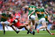 16 July 2023; Shane McGuigan of Derry is tackled by David Clifford of Kerry during the GAA Football All-Ireland Senior Championship Semi-Final match between Derry and Kerry at Croke Park in Dublin. Photo by David Fitzgerald/Sportsfile