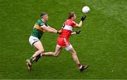 16 July 2023; Brendan Rogers of Derry in action against Paul Geaney of Kerry during the GAA Football All-Ireland Senior Championship Semi-Final match between Derry and Kerry at Croke Park in Dublin. Photo by Daire Brennan/Sportsfile