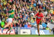 16 July 2023; Conor Doherty of Derry scores a point despite the efforts of Diarmuid O'Connor of Kerry during the GAA Football All-Ireland Senior Championship Semi-Final match between Derry and Kerry at Croke Park in Dublin. Photo by John Sheridan/Sportsfile