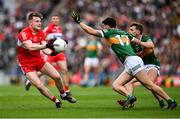 16 July 2023; Ethan Doherty of Derry in action against Tony Brosnan, 17, and Gavin White  of Kerry during the GAA Football All-Ireland Senior Championship Semi-Final match between Derry and Kerry at Croke Park in Dublin. Photo by Brendan Moran/Sportsfile