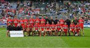 16 July 2023; The Derry squad behind a #UnitedForEquality sign before the GAA Football All-Ireland Senior Championship Semi-Final match between Derry and Kerry at Croke Park in Dublin. Photo by John Sheridan/Sportsfile