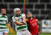 16 July 2023; Ruairí Morrissey of St Fechin's in action against Liam O'Kelly-Lynch of Naomh Eoin during the 2023 CúChulainn Hurling League Division 2 Final match between Naomh Eoin, Sligo, and St Fechin’s, Louth, at Kingspan Breffni Park in Cavan. Photo by Oliver McVeigh/Sportsfile