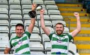16 July 2023; St Fechin’s joint captains Peter Fortune and Brian O'Connell hold aloft the cup after the 2023 CúChulainn Hurling League Division 2 Final match between Naomh Eoin, Sligo, and St Fechin’s, Louth, at Kingspan Breffni Park in Cavan. Photo by Oliver McVeigh/Sportsfile