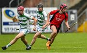 16 July 2023; Tony O'Kelly-Lynch of Naomh Eoin in action against Cathal Ryan and Seán Hodgins of St Fechin's during the 2023 CúChulainn Hurling League Division 2 Final match between Naomh Eoin, Sligo, and St Fechin’s, Louth, at Kingspan Breffni Park in Cavan. Photo by Oliver McVeigh/Sportsfile