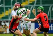 16 July 2023; Ross Berkery of St Fechin's in action against Liam O'Kelly-Lynch and Darragh Cawley of Naomh Eoinduring the 2023 CúChulainn Hurling League Division 2 Final match between Naomh Eoin, Sligo, and St Fechin’s, Louth, at Kingspan Breffni Park in Cavan. Photo by Oliver McVeigh/Sportsfile
